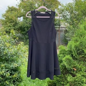 Black fit and flare dress with mesh panel details